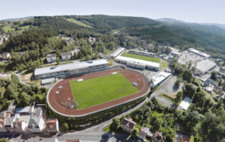 Atletický a fotbalový stadion Střelnice v Jablonci nad Nisou a okolí na leteckém pohledu